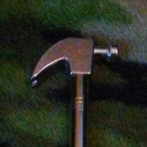 Hammer shaped glass breaker